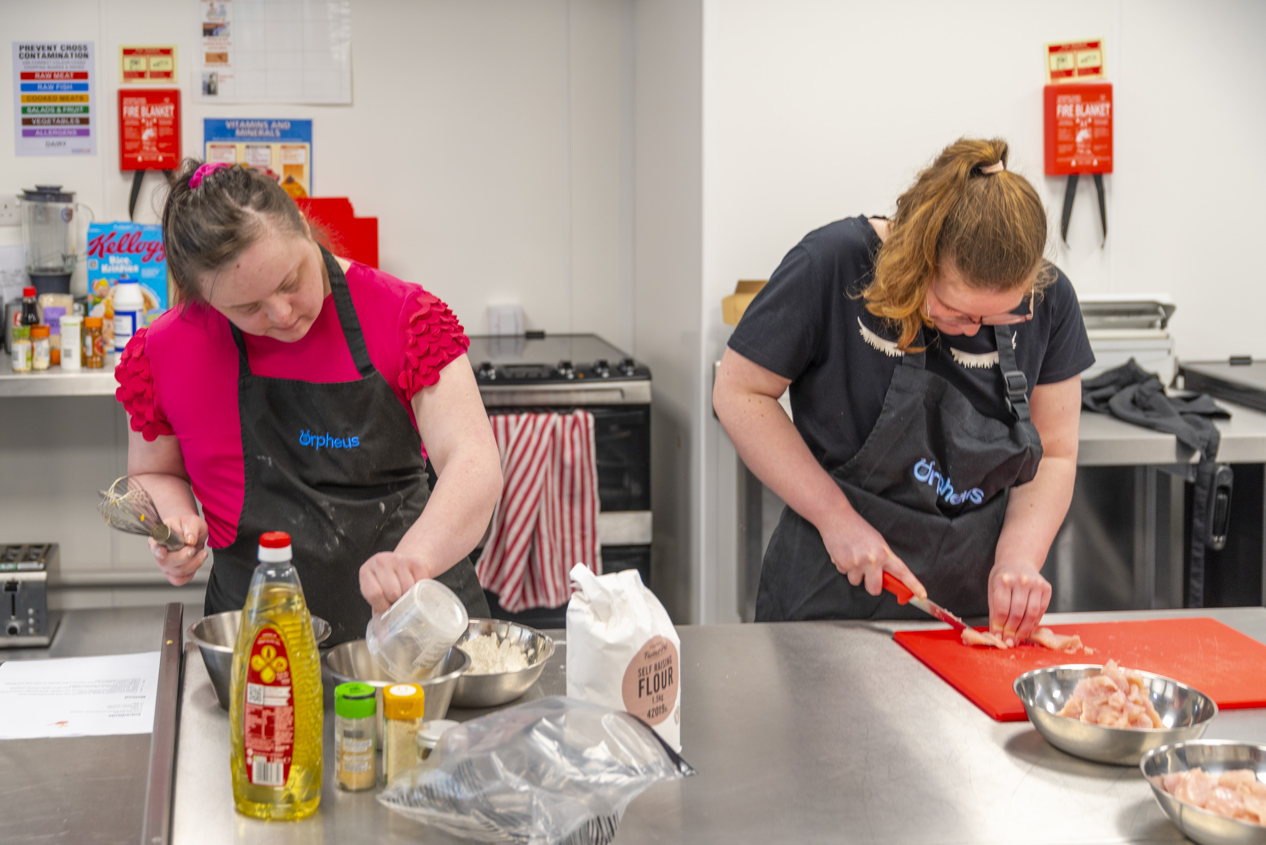 Two students working on their cooking skill