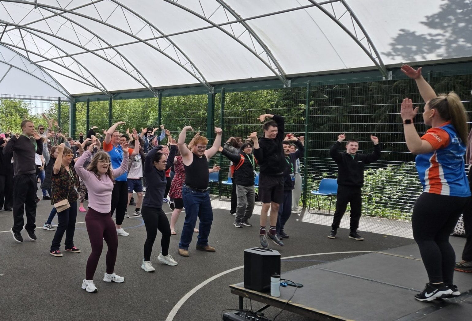 Students and staff dancing outside during the danceathon