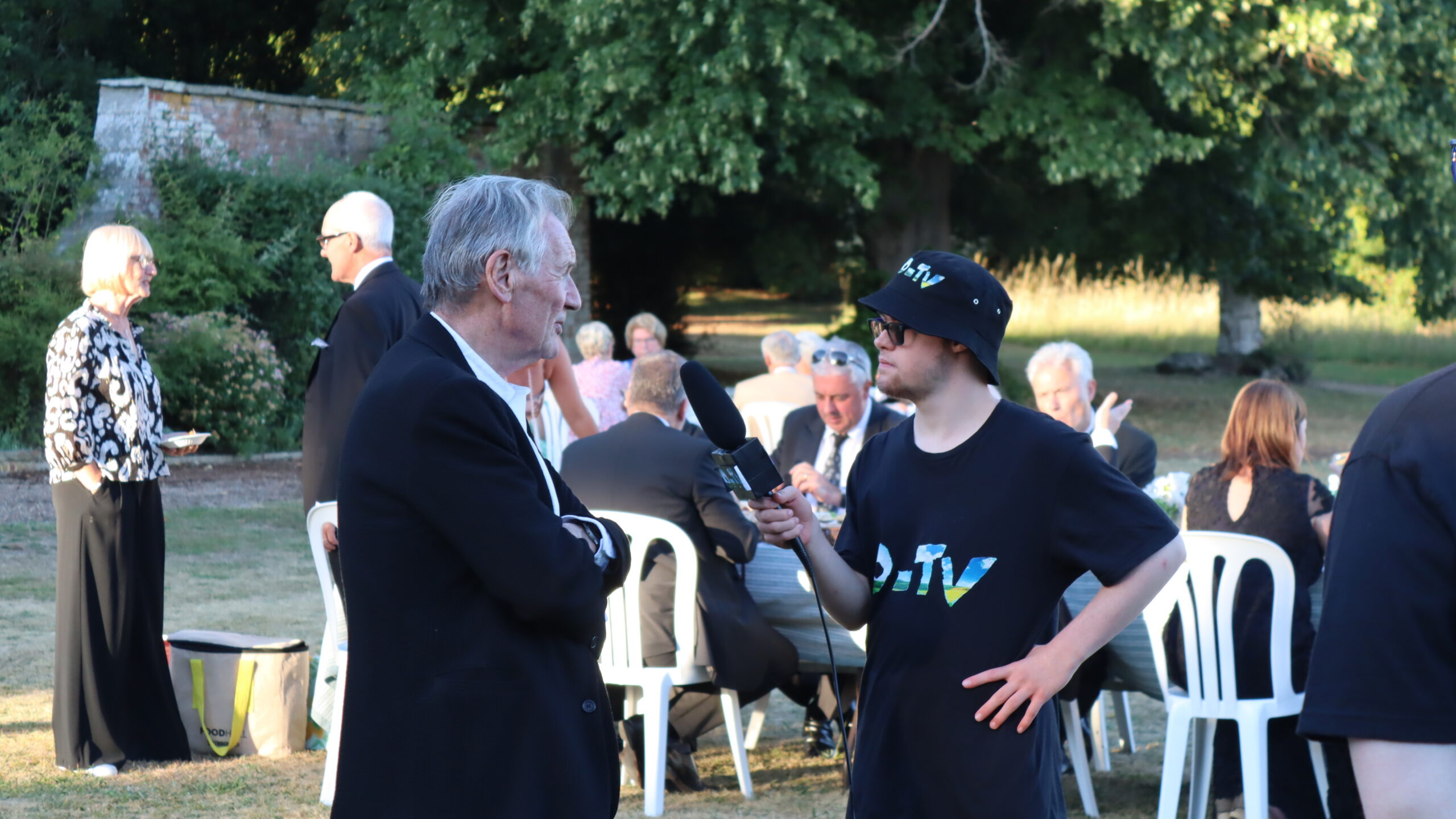Student interviewing Sir Michael Palin