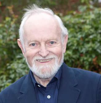 Sir Richard smiling to the camera