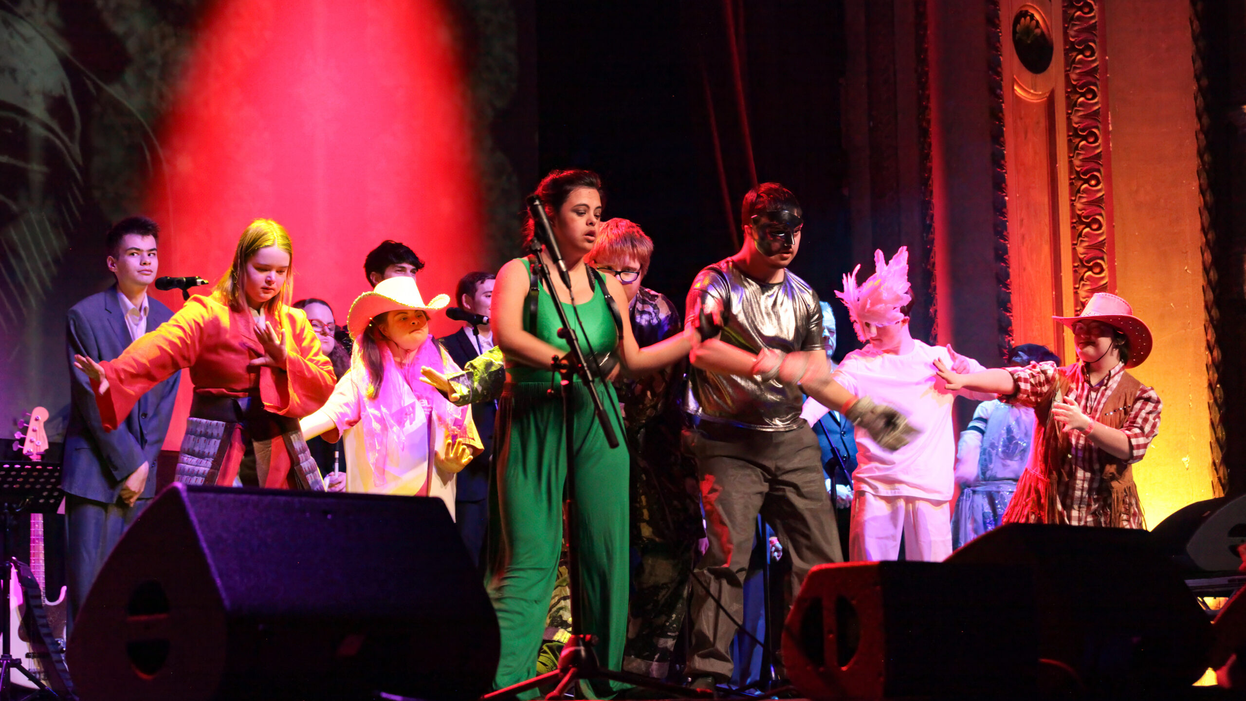 Orpheus students dancing in vibrant costumes