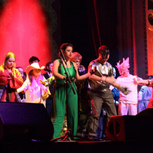 Orpheus students dancing in vibrant costumes