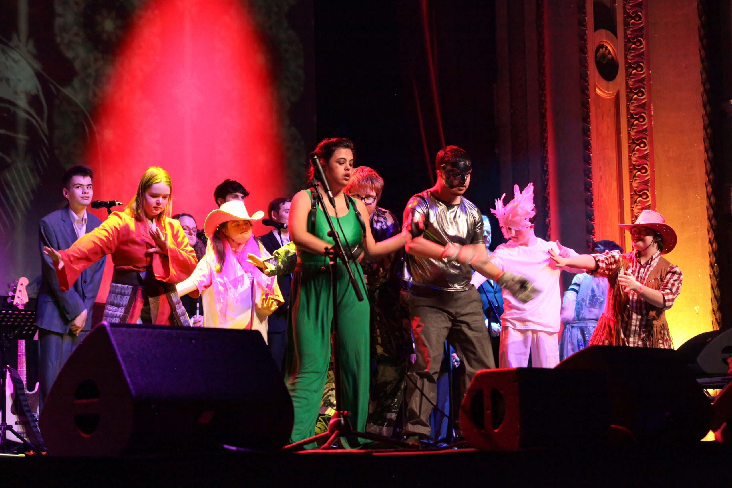 Orpheus students dancing in vibrant costumes