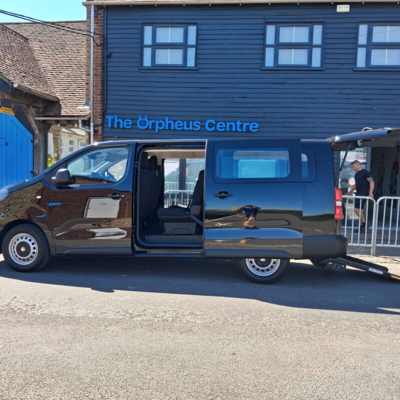 Outside the centre with the side door open