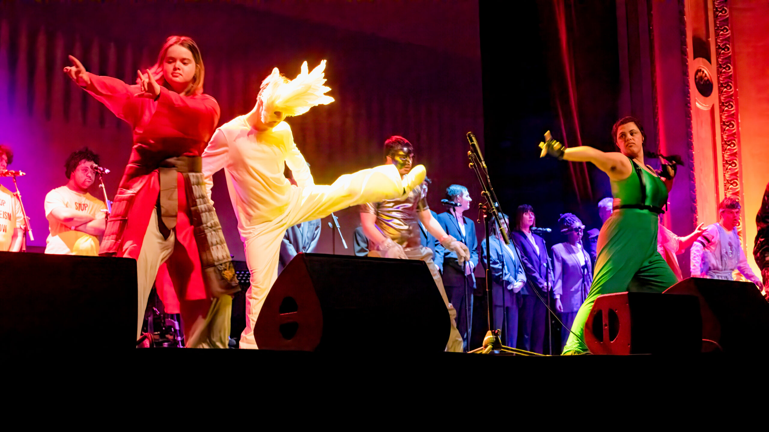 Students peforming on stage dancing